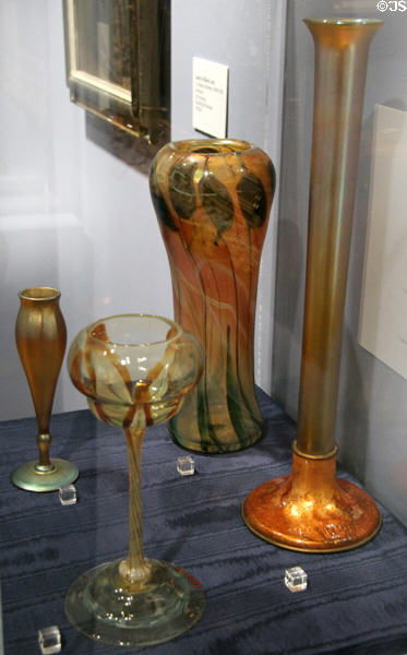 Gold iridescent glass vases & goblet by Louis Comfort Tiffany at Lyman Allyn Art Museum. New London, CT.