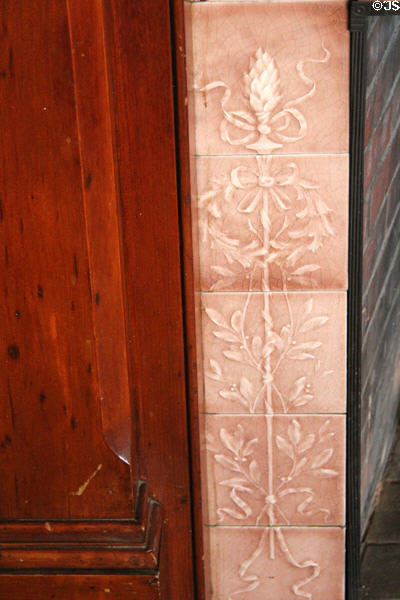 Parlor fireplace encaustic tiles at Monte Cristo Cottage. New London, CT.