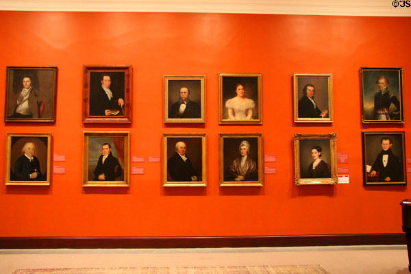 Portraits of local personages line wall of gallery at Mattatuck Museum. Waterbury, CT.