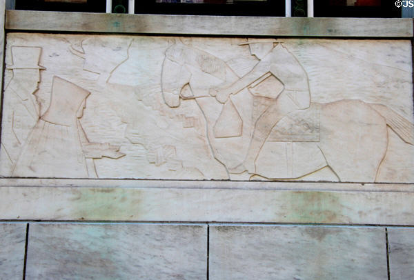 Art Deco frieze of pony rider delivering mail bag on Waterbury Post Office. Waterbury, CT.