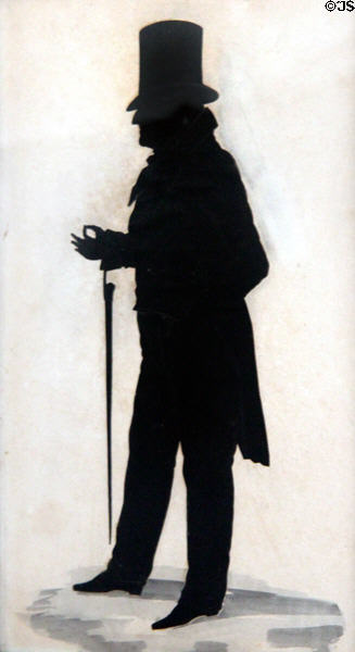 Silhouette of man with umbrella at Judson House. Stratford, CT.