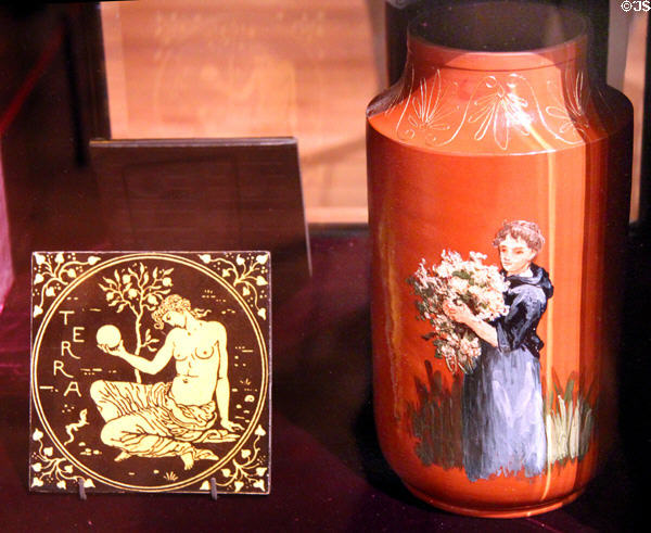 Terra tile (1870-90) by Walter Crane, made by Maw & Co. of Stoke-on-Trent, England plus earthenware vase (c1885) by Pauline Pottery of Chicago, IL at Yale University Art Gallery. New Haven, CT.