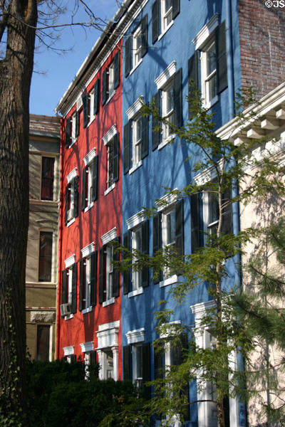 Red & blue contrast of row houses at 20-22 3rd St. SE. Washington, DC.