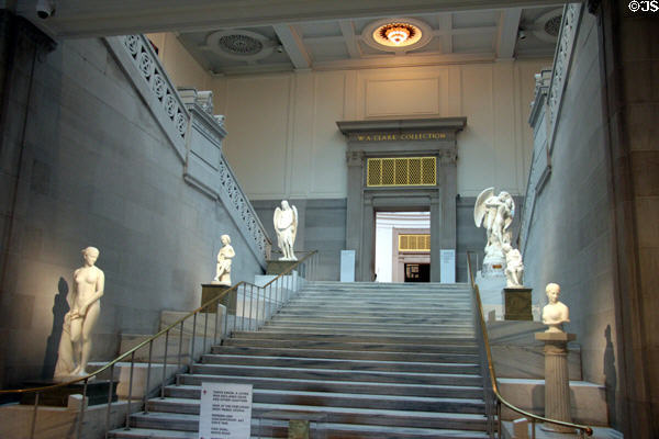 Central staircase with sculptures in Corcoran Gallery of Art. Washington, DC.