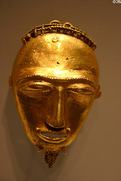 Gold pendant of African face with beard from Ivory Coast (19th or 20thC) in National Museum of African Art. Washington, DC.
