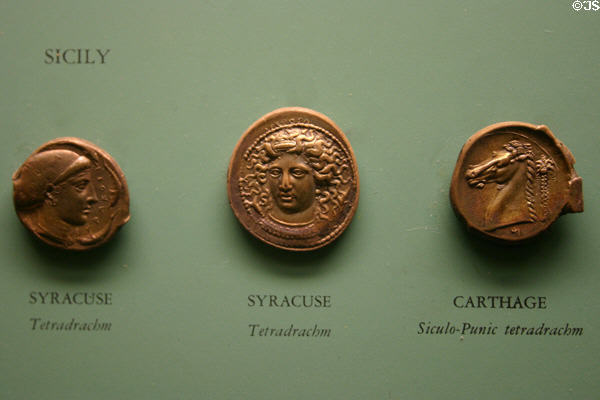 Ancient coins from Syracuse & Carthage with Medusa, portraits & horse head in American History Museum. Washington, DC.