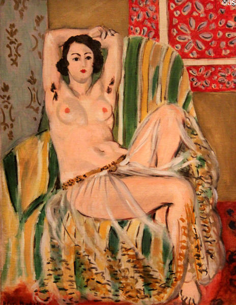 Odalisque Seated with Arms Raised, Green Striped Chair painting (1923) by Henri Matisse at National Gallery of Art. Washington, DC.