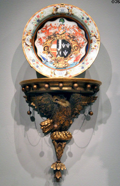 Porcelain charger with arms of Okeover family of England (1739-42) from Jingdezhen, China & wall bracket (1780-1810) from Philadelphia at National Gallery of Art. Washington, DC.