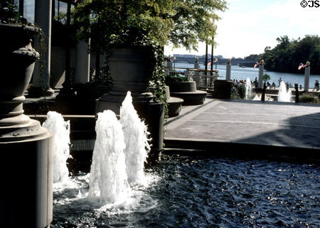 Fountains & Potomac River at Washington Harbor. Washington, DC.