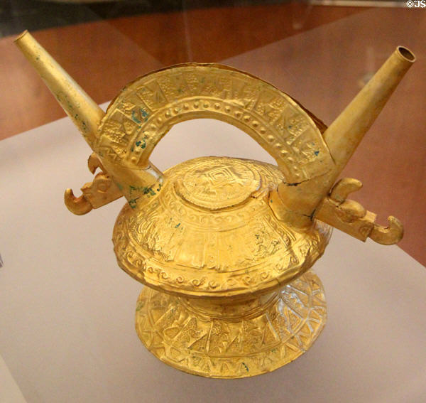 Lambayeque gold double-spout & bridge bottle (900-1100) from Peru at Dumbarton Oaks Museum. Washington, DC.