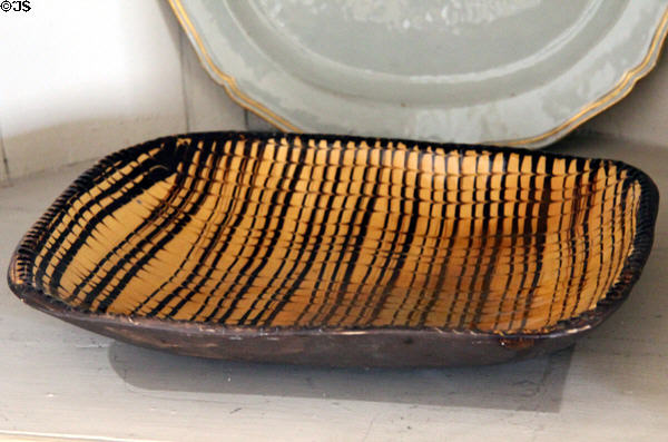 Serving dish with lined pattern at Old Stone House. Washington, DC.