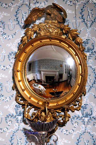 Girandole convex mirror with American eagle (19thC) from Europe in Virginia period dining room (1800-10) at DAR Memorial Continental Hall. Washington, DC.