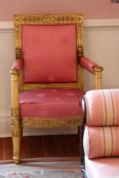 Gilded armchair (1817) ordered by President James Monroe for Executive Mansion from Pierre-Antoine Bellangé of France in Tennessee period parlor at DAR Memorial Continental Hall. Washington, DC.