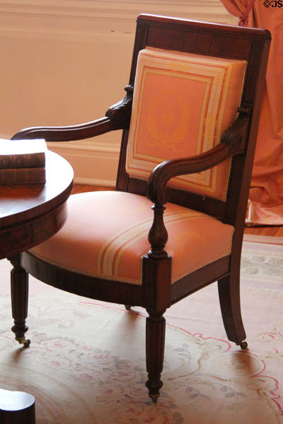 Armchair (1818) ordered by President James Monroe for Executive Mansion from William King Jr. of Georgetown in Tennessee period parlor at DAR Memorial Continental Hall. Washington, DC.