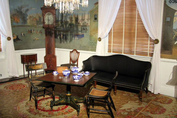 Maryland period parlor (1830s) noted for its scenic wallpaper from Paris & Baltimore-made card table (1820-30) & tall case clock (1802-10) by David Shoemaker of Mount Holly, NJ at DAR Memorial Continental Hall. Washington, DC.