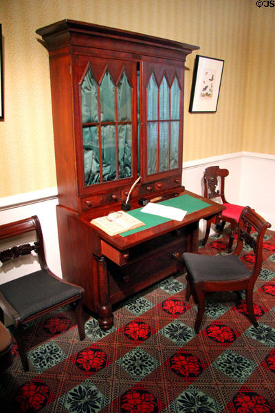 Alabama period parlor (1835-40) with Mahogany desk & bookcase (1820-40) from New York City at DAR Memorial Continental Hall. Washington, DC.