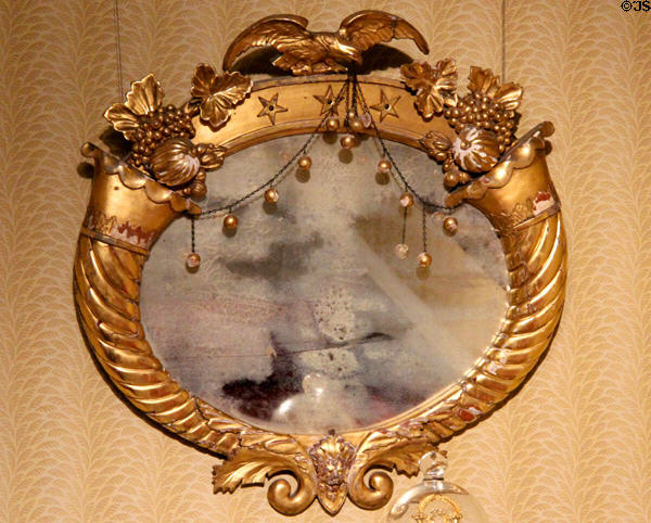 Neoclassical looking glass (c1820) possibly from New York in Alabama period parlor at DAR Memorial Continental Hall. Washington, DC.