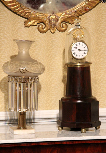 Astral oil lamp (1849-55) by Cornelius & Co. & lighthouse clock (1825-8) made by Simon Willard & Sons of Roxbury, MA in Alabama period parlor at DAR Memorial Continental Hall. Washington, DC.