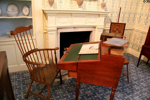 Mahogany desk (1800-15) from New England or New York & Windsor chair (1780-1810) from PA or Southern U.S. in West Virginia period parlor (early 19thC) at DAR Memorial Continental Hall. Washington, DC.