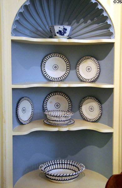 Corner hutch with Wedgwood pearlware (1868-1900) from England in West Virginia period parlor at DAR Memorial Continental Hall. Washington, DC.