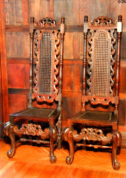 Carved oak chairs with cane seats (1910-11) by G. Gerald Evans of Philadelphia in New Jersey period English Chamber at DAR Memorial Continental Hall. Washington, DC.