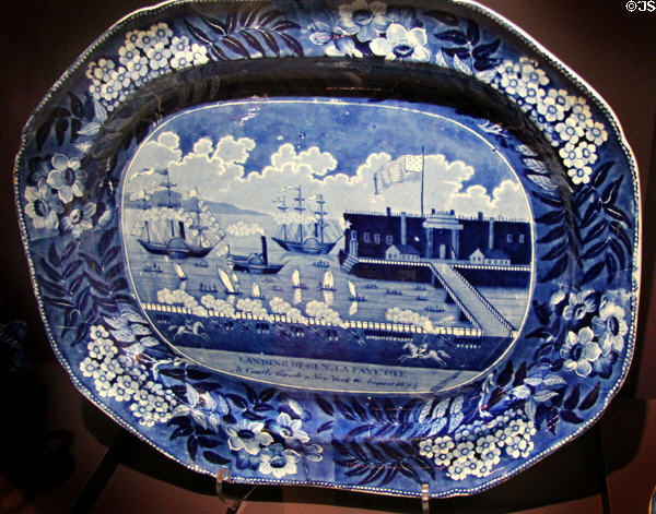 Transfer printed plate (c1825) commemorating landing of Lafayette at Castle Clinton New York on Aug. 16, 1821 by James & Ralph Clews of Staffordshire, England at DAR Memorial Continental Hall Museum. Washington, DC.