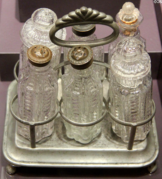 Glass & pewter caster set (1825-30) by Boston & Sandwich Glass Co., Sandwich, MA at DAR Memorial Continental Hall Museum. Washington, DC.