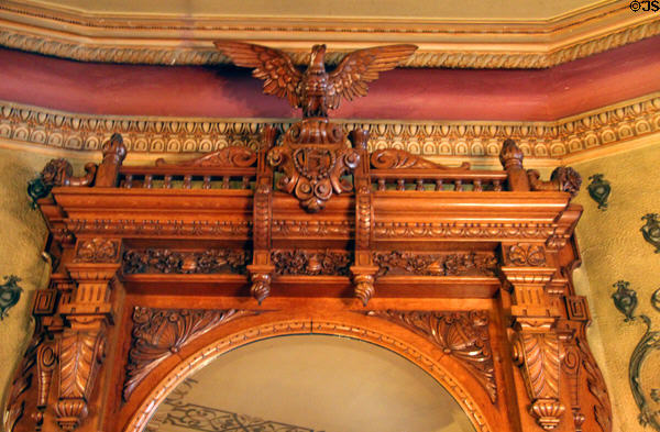 Carved eagle atop entrance hall fireplace by August Grass at Christian Heurich Mansion. Washington, DC.