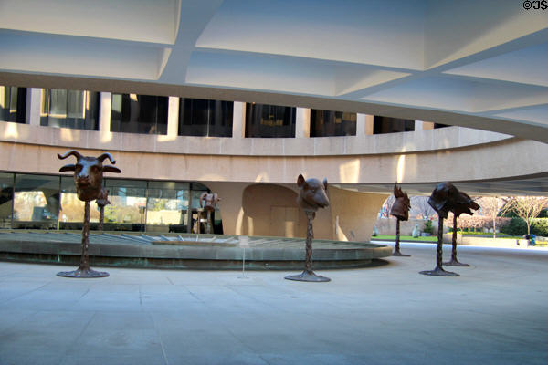 Central courtyard of Hirshhorn Museum with display of zodiac heads modern sculpture. Washington, DC.