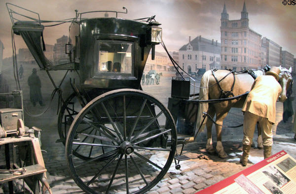 Hansom cab (c1900) where driver sat behind passengers at National Museum of American History. Washington, DC.