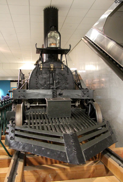 John Bull Locomotive (1831) from England had to have guide wheels added to keep from derailing on uneven American track at National Museum of American History. Washington, DC.