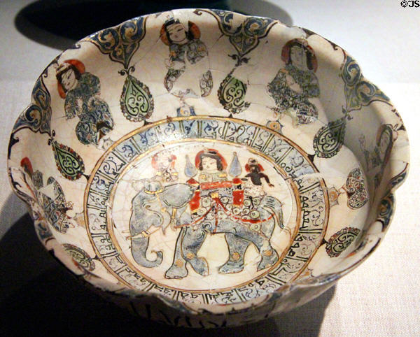 Enameled earthenware bowl with elephant & rider (late 12th- early 13thC) from Iran at Smithsonian Freer Gallery of Art. Washington, DC.