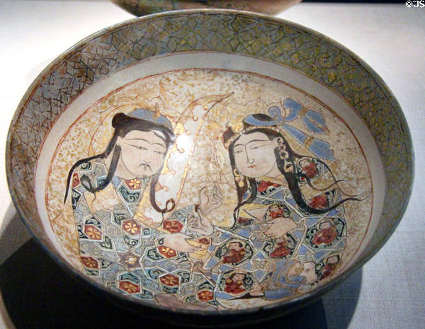 Enameled earthenware bowl with couple (early 13thC) from Iran at Smithsonian Freer Gallery of Art. Washington, DC.