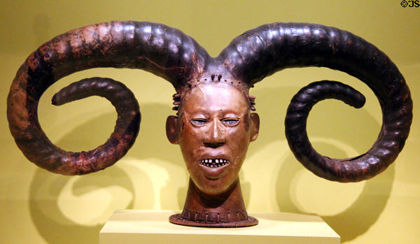 Wood mask (early 20th C) attrib. Efik peoples of Nigeria at National Museum of African Art. Washington, DC.