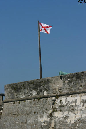 Burgundy Cross flag of first Spanish Colonial period in Florida (1506-1785) over Castillo de San Marcos. St Augustine, FL.