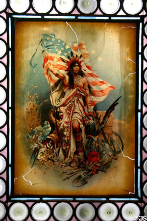 Lithographed parchment on window shows Indian maid with U.S. flag (c1880) at Lightner Museum. St Augustine, FL.