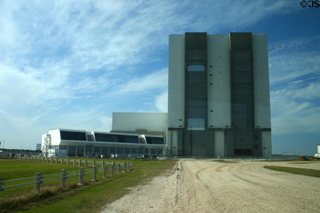 Gravel road leading from Vehicle Assembly Building so crawler can carry space shuttle to launch pad at Kennedy Space Center. FL.