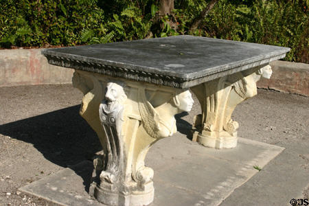 Table with sculpted pedistal in Vizcaya Garden. Miami, FL.