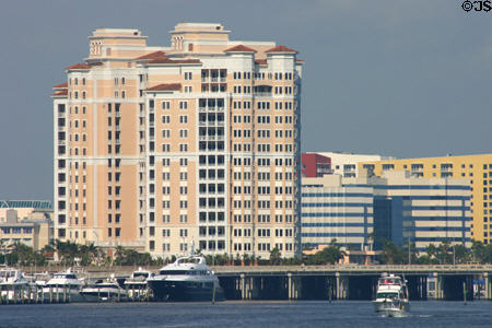 Flagler Memorial Bridge across Intercoastal Waterway & pink condo. West Palm Beach, FL.