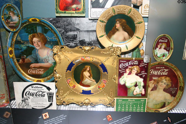 Early advertising trays (c1908) at Coca-Cola Museum. Atlanta, GA.