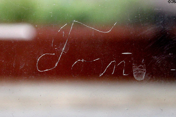 Earliest known signature of President Tom Woodrow Wilson scratched in glass pane at Boyhood Home. Augusta, GA.