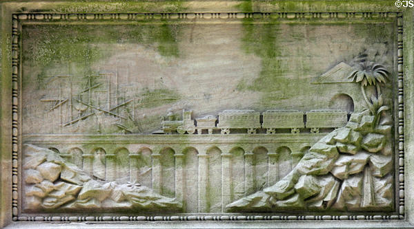 Relief on Monument to William Washington Gordon shows train on viaduct with sailing ship. Savannah, GA.