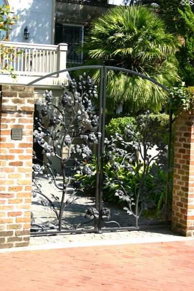 Modern gate with Magnolia theme by East Wayne Iron Works above Calhoun Square. Savannah, GA.