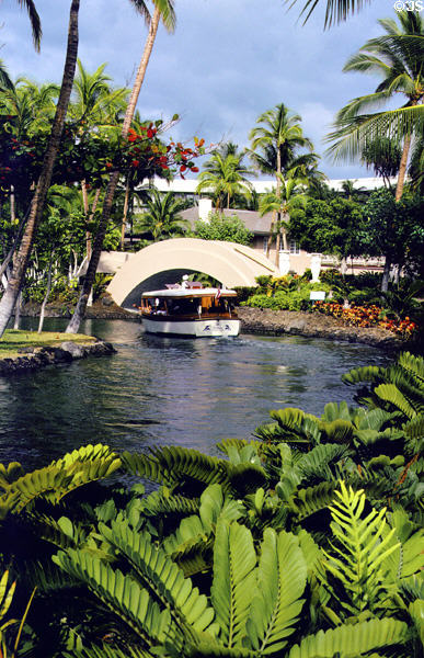 Guests transported by boat around Hilton Waikoloa Village hotel. Big Island of Hawaii, HI.