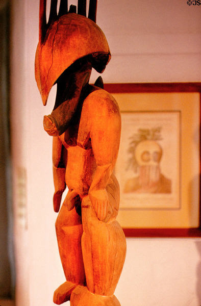 Statue of part man, part pig demi-god Kama Pua'a, the only native wooden statue found on Maui, at Bailey House Museum, Wailuku. Maui, HI.