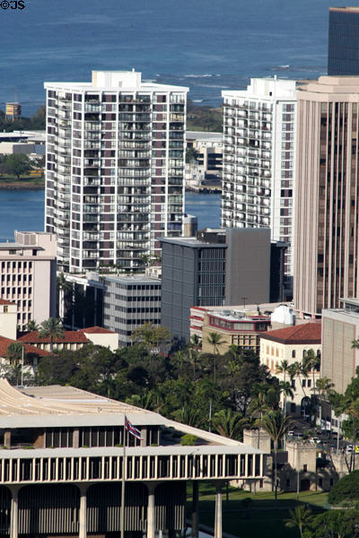 Harbor Square Towers over heritage buildings surrounding Hawaii State Capitol. Honolulu, HI.