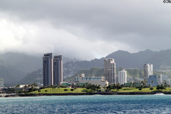 One Waterfront Towers & Keola Lai against Punchbowl crater & hills above Honolulu. Honolulu, HI.