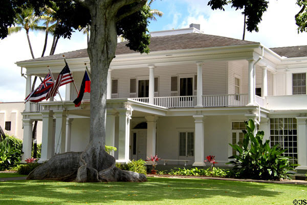 Washington Place (1846) amid tropical plants. Honolulu, HI.