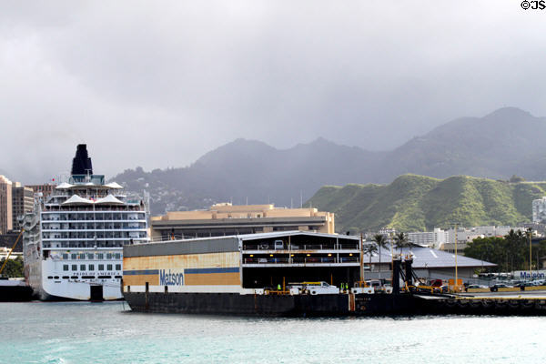 Matson ferry boat & Pride of America in Honolulu harbor. Honolulu, HI.