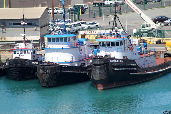 Tug boats in Honolulu harbor. Honolulu, HI.